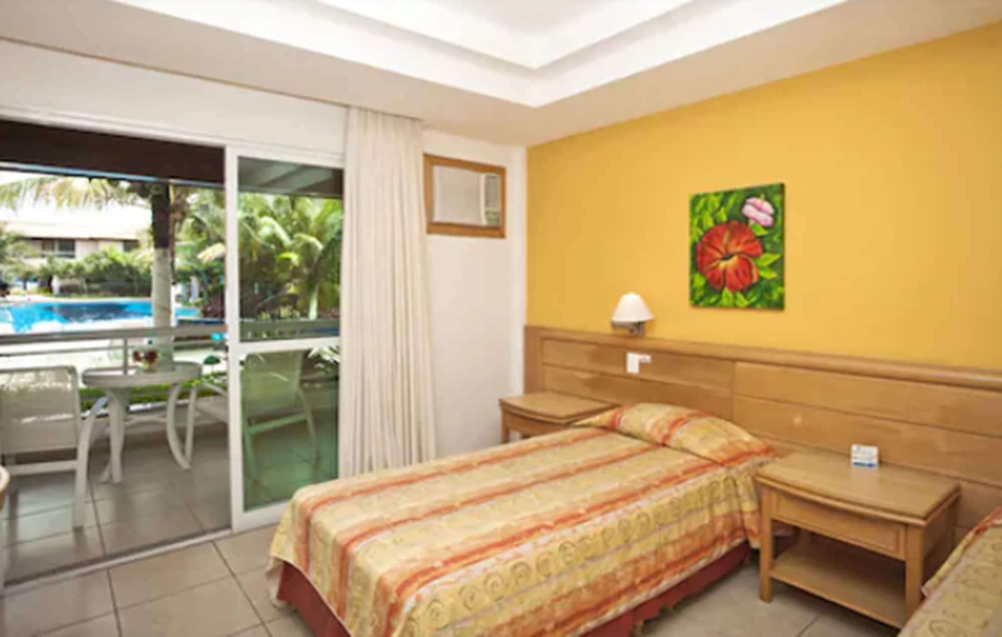 Hotel Atlântico Búzios Convention Extérieur photo A bedroom