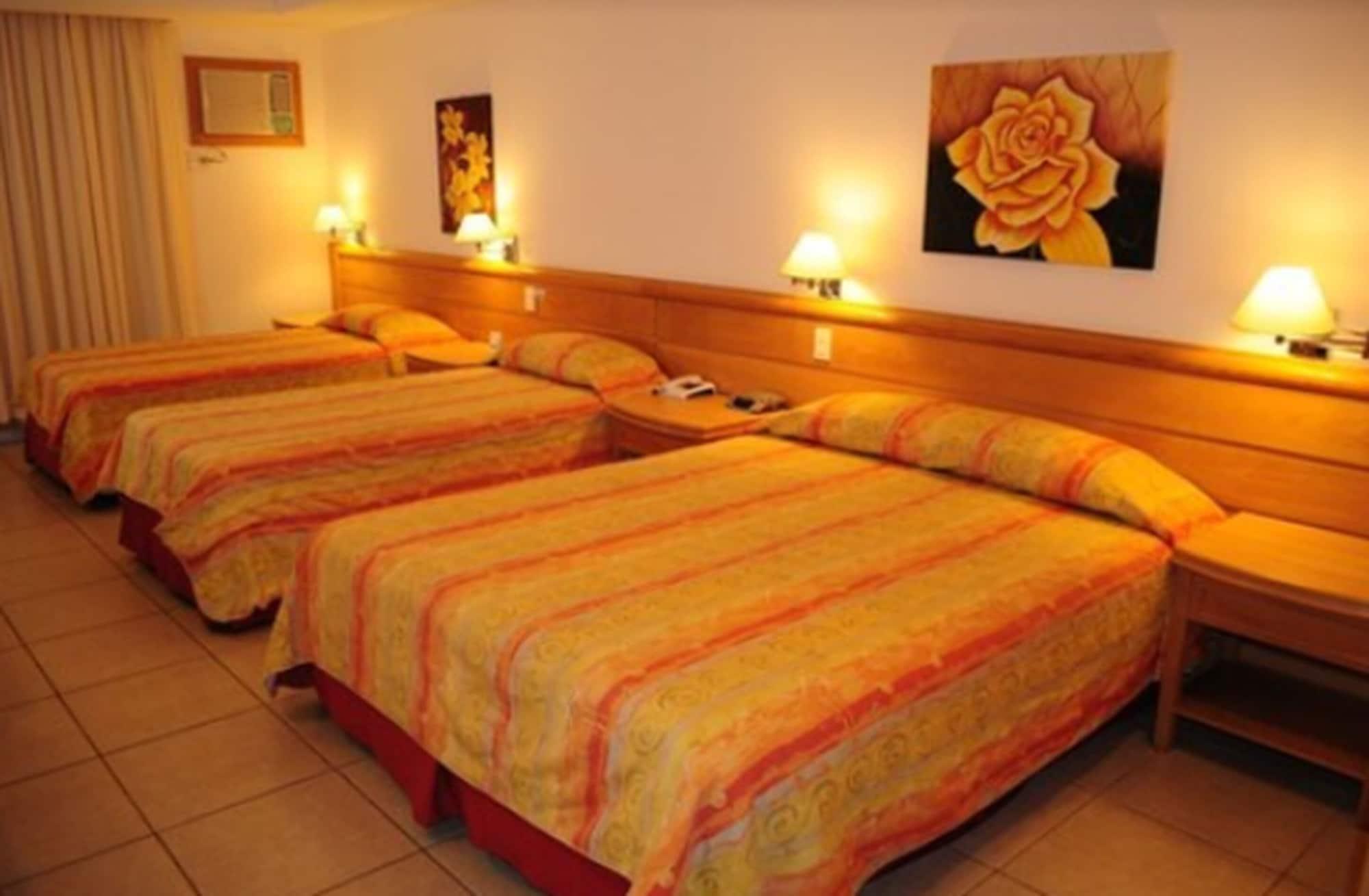 Hotel Atlântico Búzios Convention Extérieur photo A room at the hotel