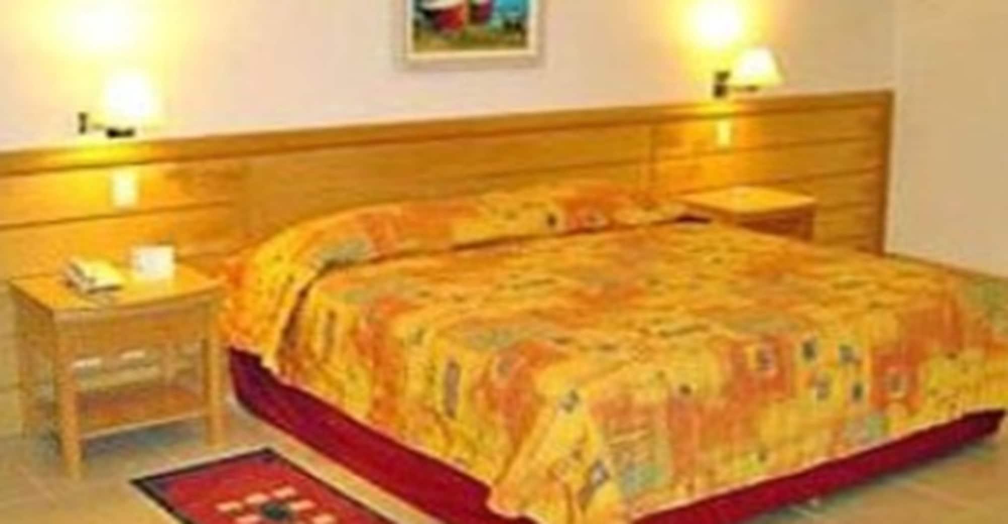 Hotel Atlântico Búzios Convention Extérieur photo A bed